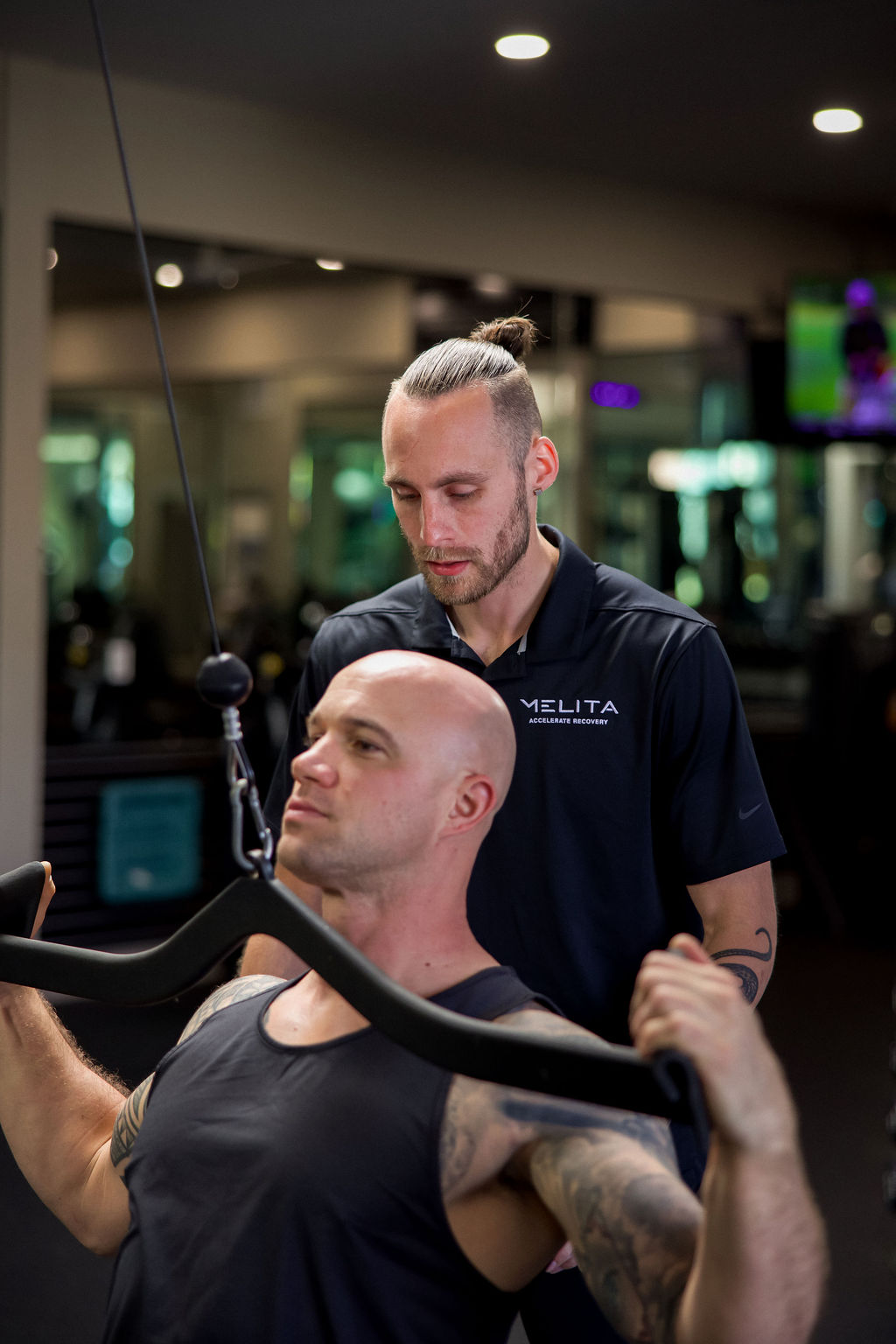 Melita ReGen Lab specialist guiding a client through a biomechanical assessment